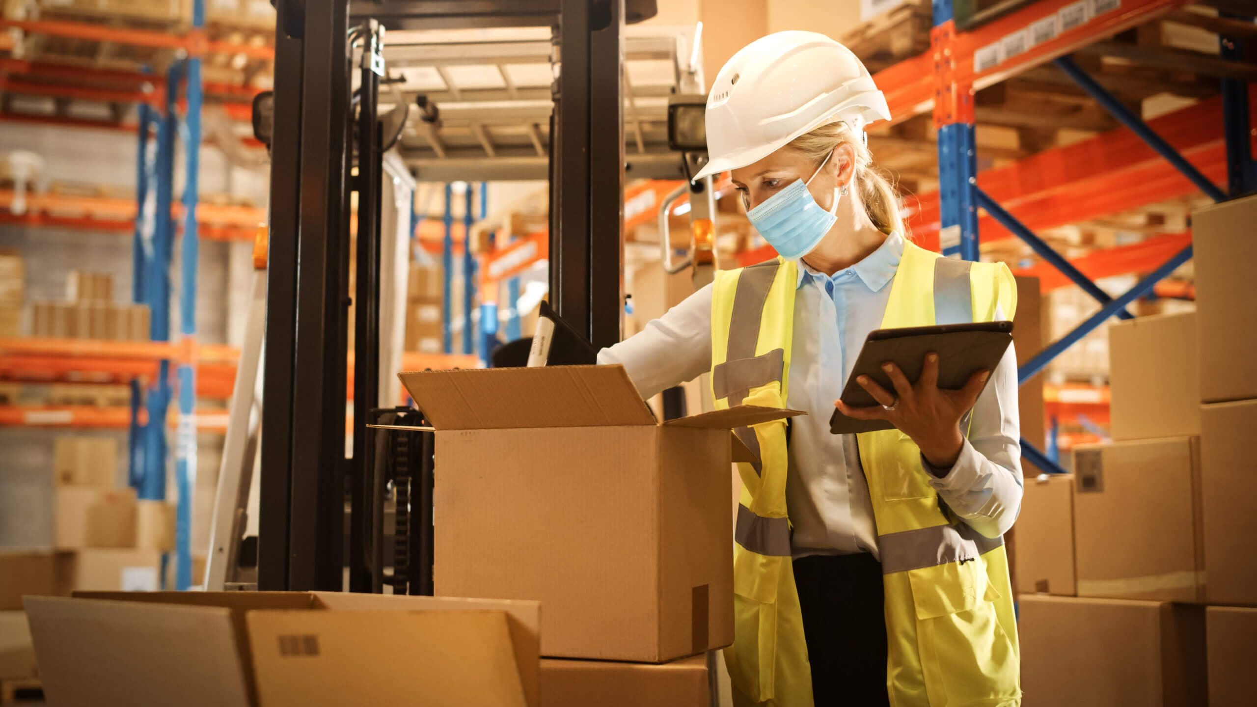 warehouse worker using zebra tablet